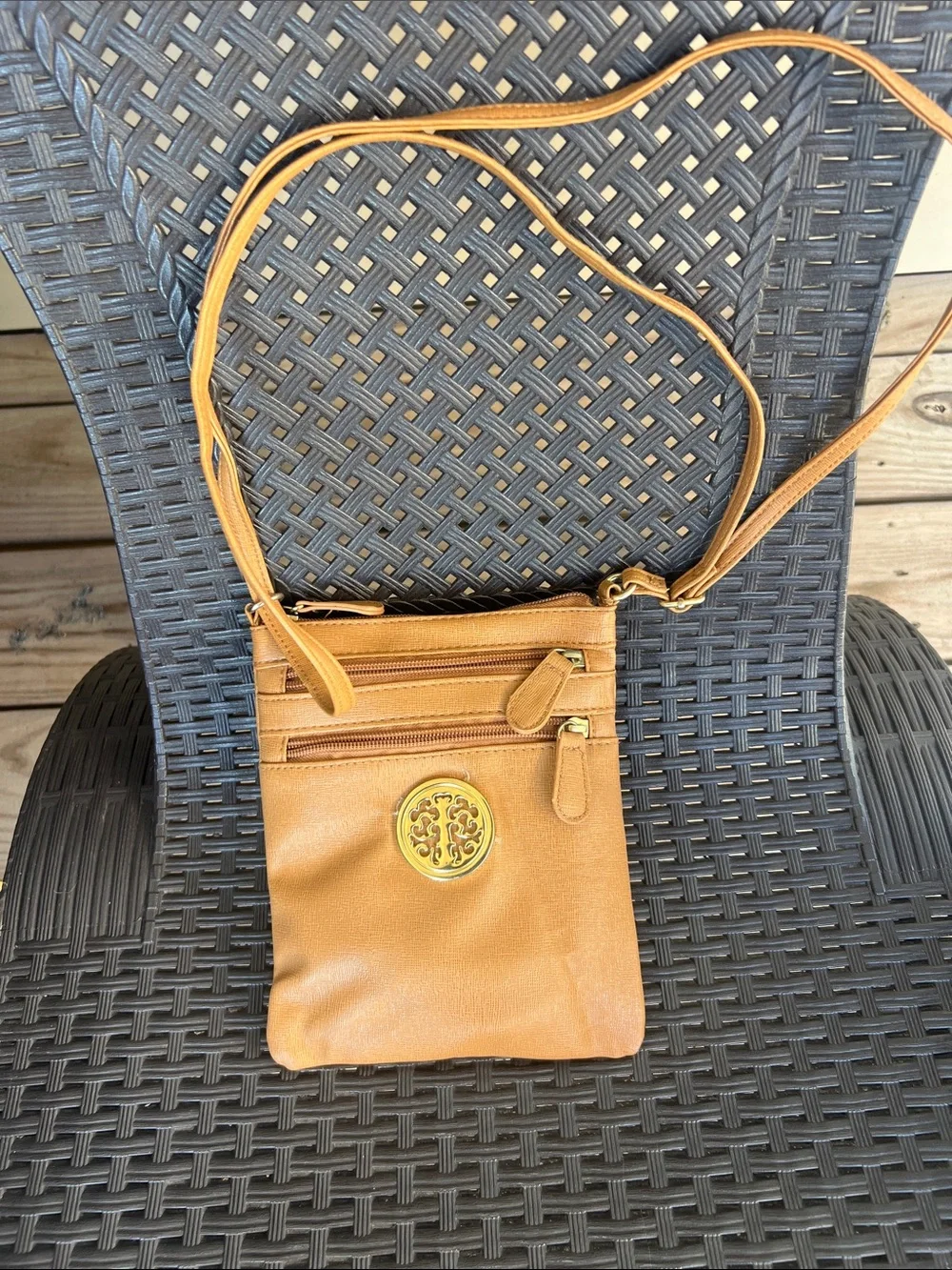 Women’s Tan Crossbody Bag with Gold Medallion Accent